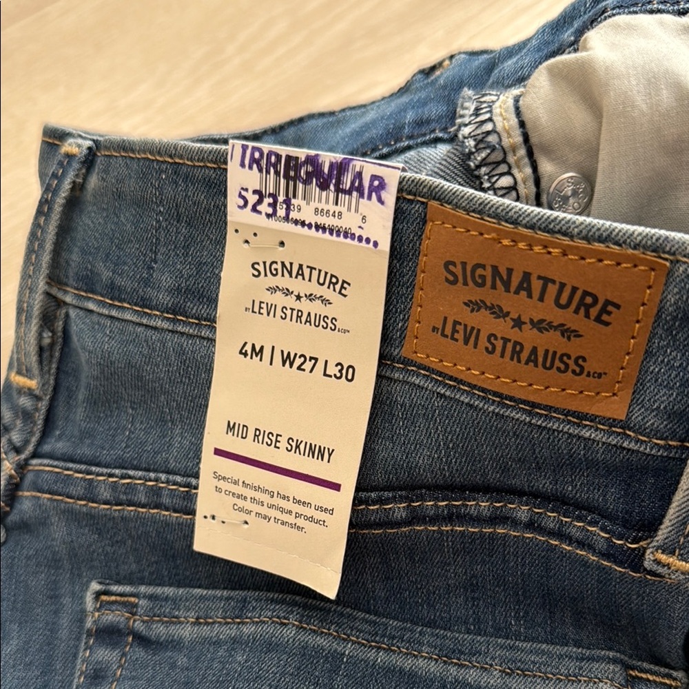 3/$10 Levi's Blue Mid Rise Slim Jeans - Picture 7 of 10